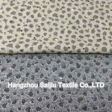 Polyester/Spandex Hachi Printed On Ivory Silver Color With Disco Dot Fabric